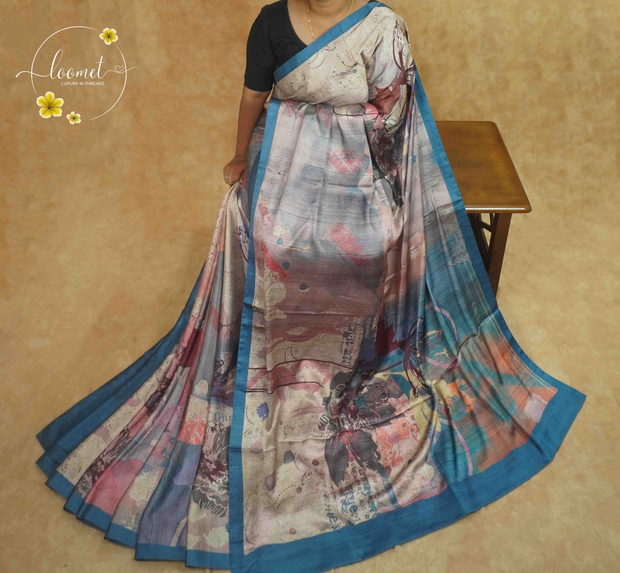 APL80001 Misty Silver & Teal Blue Modal Stain saree with floral digital print.