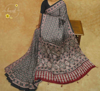 APL8123 Charcoal Grey & Crimson Red Semi Modal Silk with ornamental floral jaal and edge tassels.