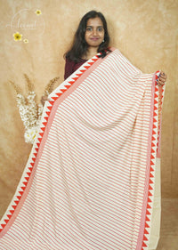 APL8601 Off-White Crepe Silk saree with vertical pinstripes in red.