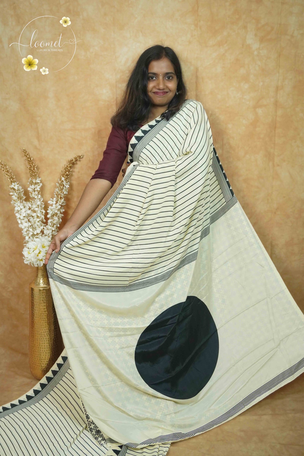 APL8606 Off-White Crepe Silk saree with vertical black pinstripes.