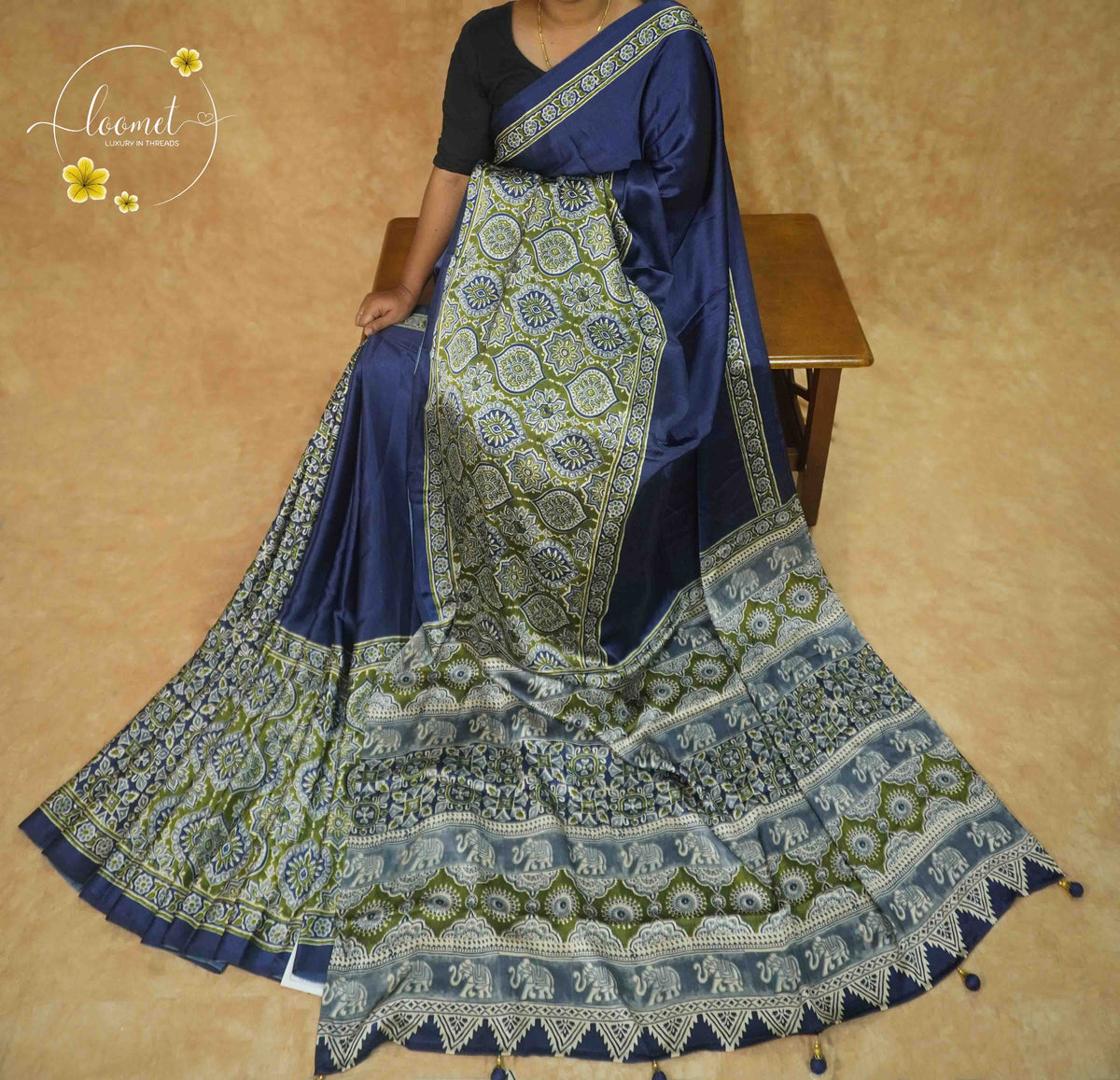 APL9121 Royal Indigo Semi Modal Silk saree with olive green ajrakh aallu and elephant motifs.