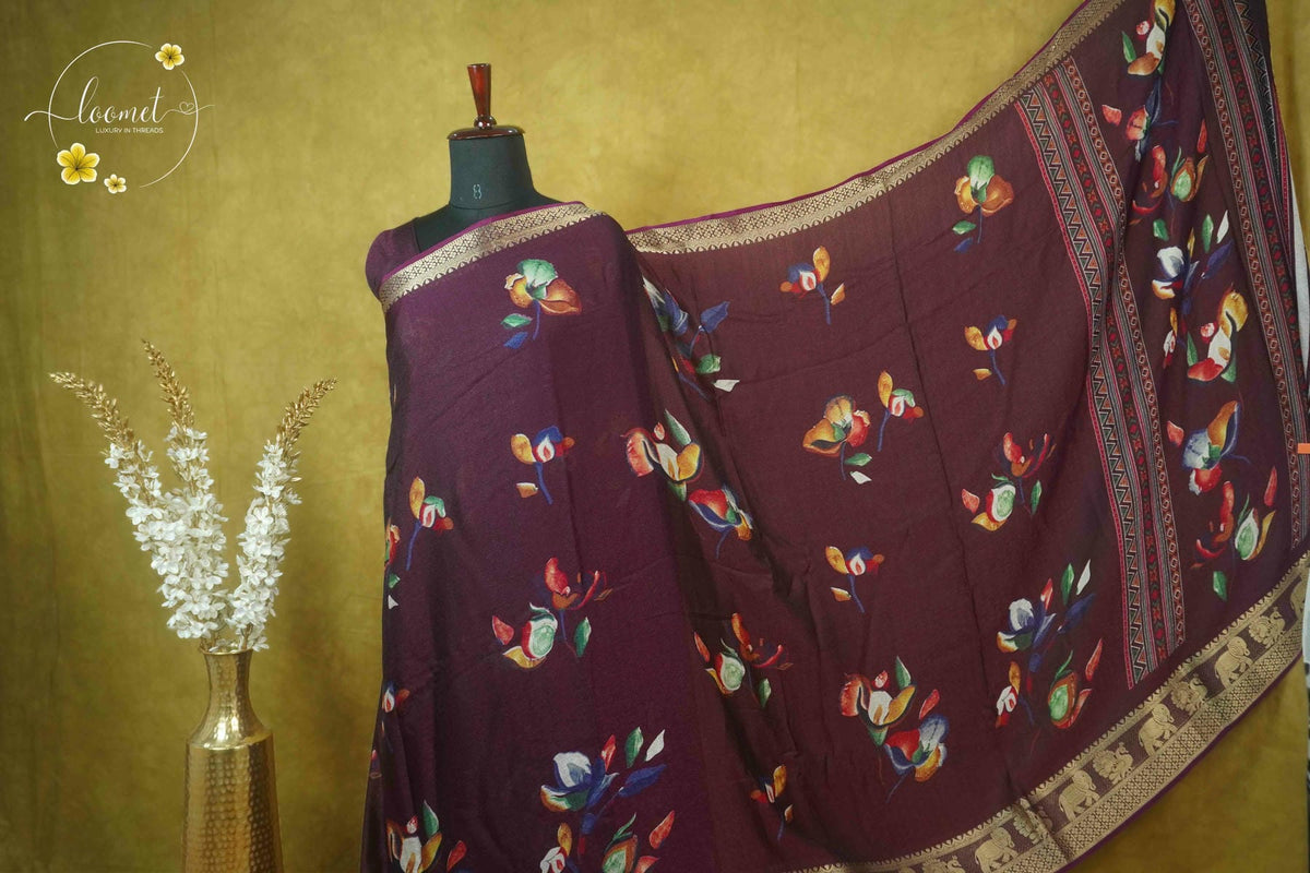 ARN21001 Deep burgundy Georgette saree with multicolor floral bouquets.