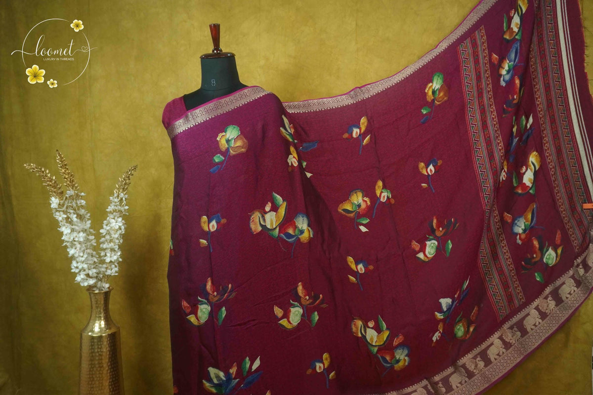 ARN21004 Magenta Georgette saree with multicolor floral bouquets.