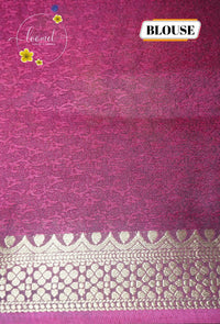 ARN21004 Magenta Georgette saree with multicolor floral bouquets.