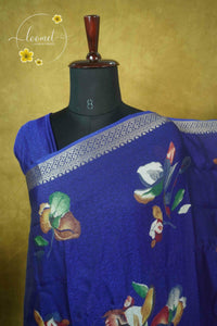 ARN21006 Royal Blue Georgette saree with multicolor floral bouquets.
