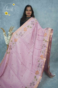 ARN2301 Pastel pink Kota cotton saree features floral vines with gold zari striped border.