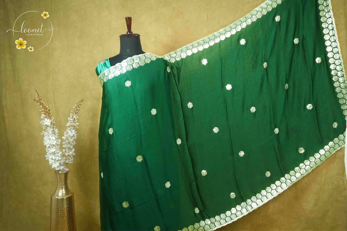 ARN2502 Emerald green Chiffon saree with hexagonal buttas.