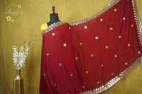 ARN2503 Crimson Red Chiffon saree with hexagonal buttas.