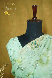 ARN2601 Pastel Lime Green Organza saree with large-scale floral print.