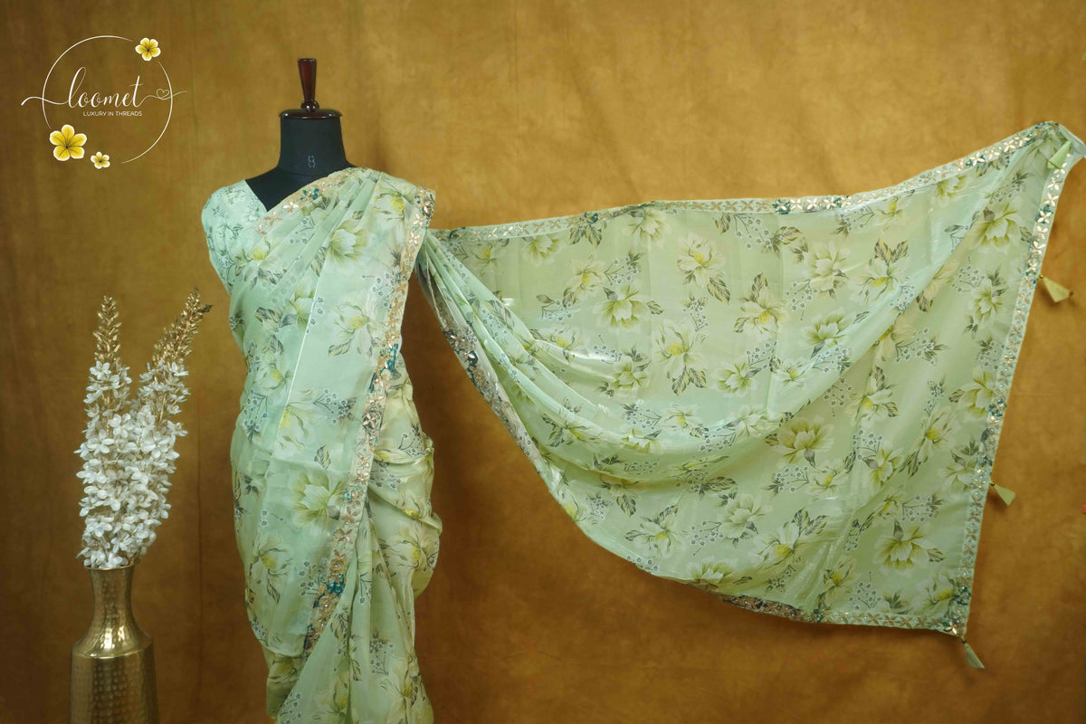 ARN2601 Pastel Lime Green Organza saree with large-scale floral print.