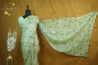 ARN2601 Pastel Lime Green Organza saree with large-scale floral print.