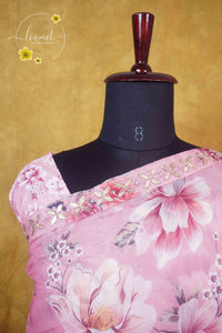 ARN2602 Pastel Peach-Pink Organza saree with large-scale floral print.