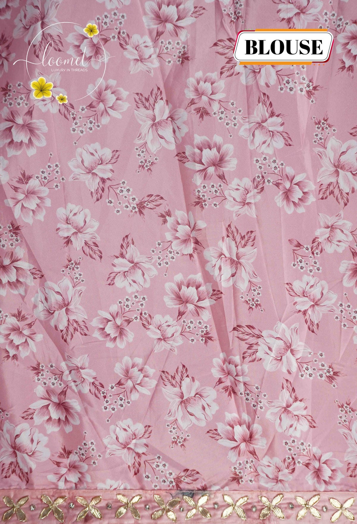 ARN2602 Blush pink saree features an all-over floral print with a sequined scallop border and matching tassels on the pallu.