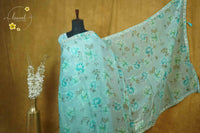 ARN2604 Aqua Blue Organza saree with large-scale floral print.