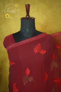 ARN3102 Deep maroon Jute Georgette saree with leaf motifs.