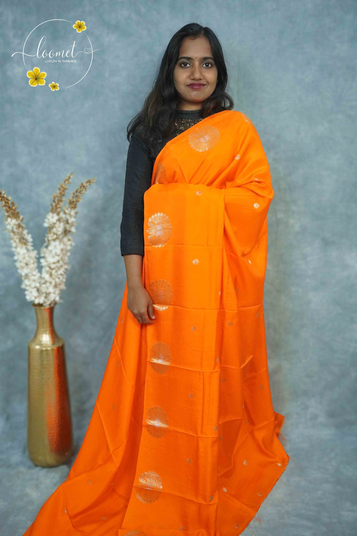 ARN3403 Orange Mysore silk saree with copper zari peacock buttas.