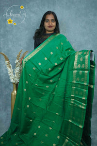 ARN3405 Leaf Green Mysore Silk saree features gold zari mango buttas with paisley borders.
