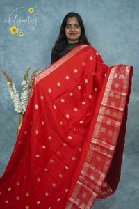 ARN3409 Crimson Red Mysore Silk saree features floral buttas with zari paisley borders.
