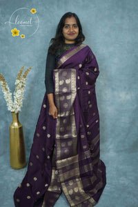 ARN3410 Violet Mysore Silk saree features floral buttas with zari paisley borders.