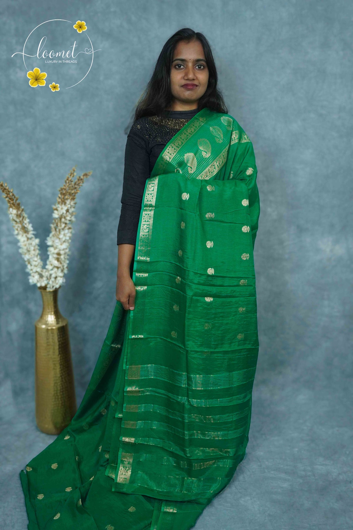 ARN3412 Leaf Green Mysore Silk saree features floral buttas with zari paisley borders.