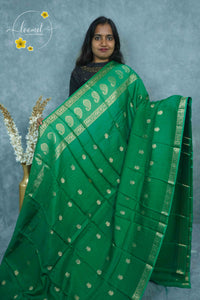 ARN3412 Leaf Green Mysore Silk saree features floral buttas with zari paisley borders.