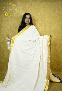 ASB2540 Off-White Mul-Cotton saree with plain body pattern.