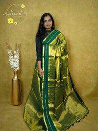 ASB25601 Metallic Olive Tissue Cotton saree with plain body pattern.