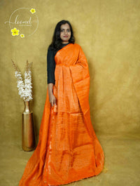 ASB25611 Tangerine Orange Linen-Tissue saree with metallic shimmer.