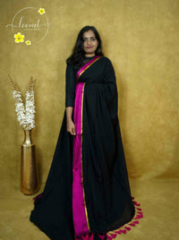 ASB25630 Jet Black & Rani Pink  Mul-Cotton saree with plain body pattern.
