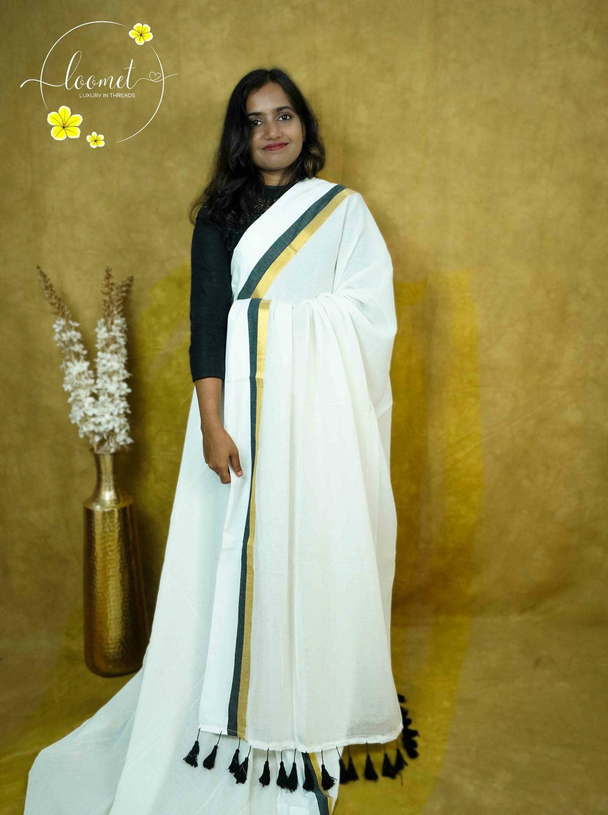 ASB25632 Off-White Mul-Cotton saree with plain body pattern.