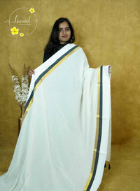 ASB25632 Off-White Mul-Cotton saree with plain body pattern.