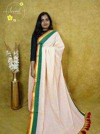 ASB25633 Peach Mul-Cotton saree with plain body pattern.