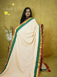 ASB25633 Peach Mul-Cotton saree with plain body pattern.