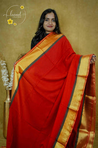 ASB25634 Crimson Red Mul-Cotton saree with plain body pattern.