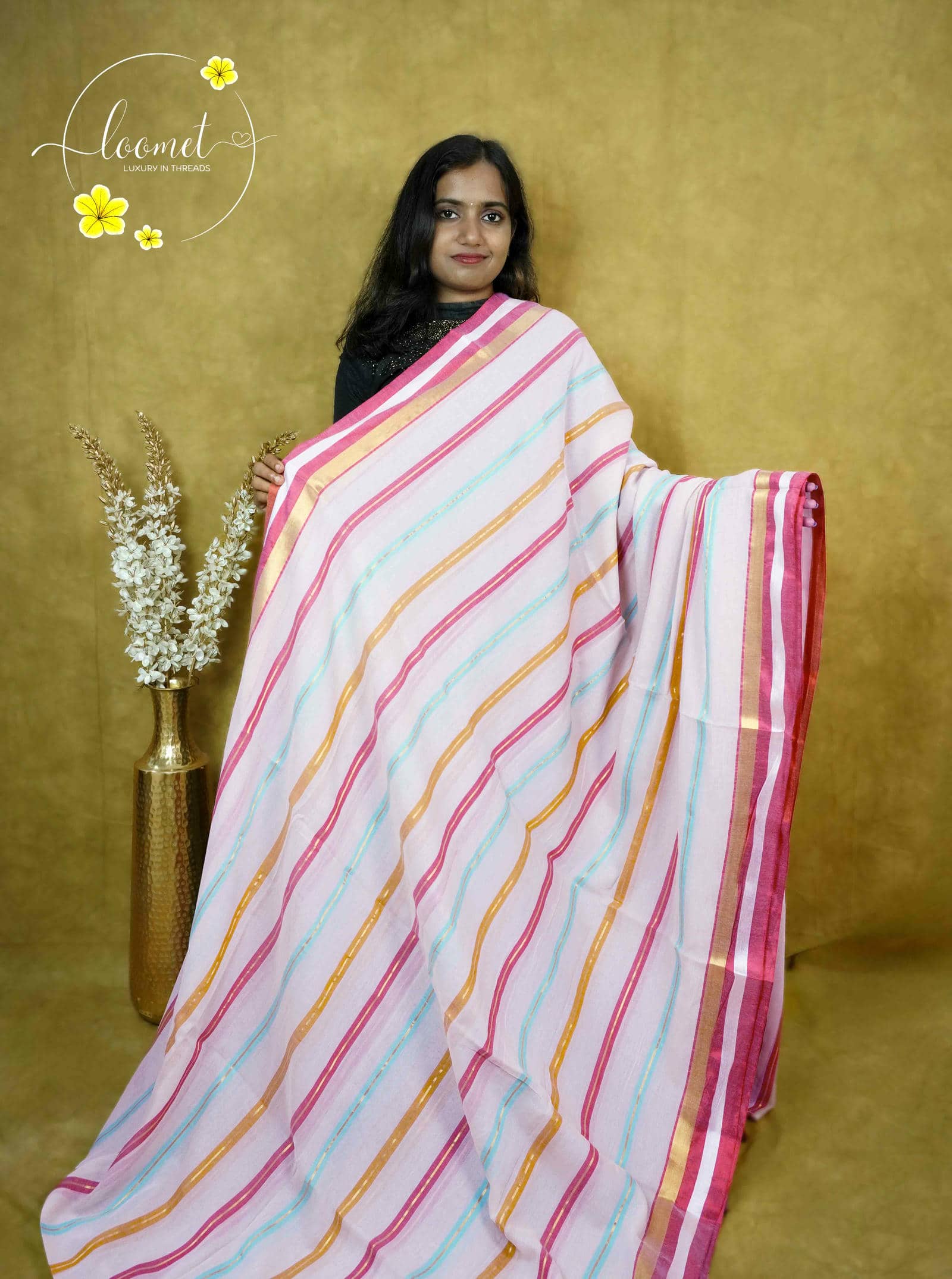 ASB25637 Off-White saree with a vibrant bold multi-coloured vertical stripe design red, gold, yellow, and aqua blue and finished with multi-coloured tassels.