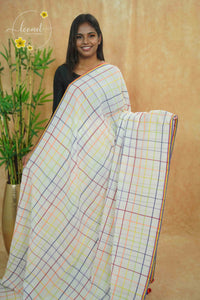ASB25650 Off-white Mul Cotton saree with multicolor grid pattern.