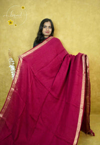 ASB2567 Magenta Linen-Cotton saree with solid minimalist design.