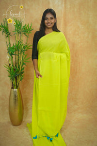 ASB25671 Neon Lime Green Mul Cotton saree with striped texture, shimmering silver sequins.