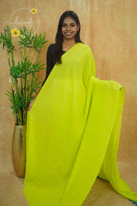 ASB25671 Neon Lime Green Mul Cotton saree with striped texture, shimmering silver sequins.