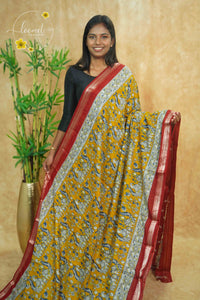 ASM1531 Mustard Yellow and Maroon kalamkari cotton saree with peacock and floral prints.