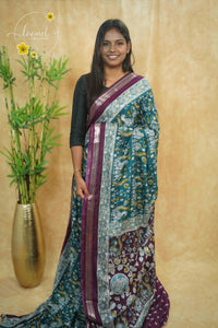 ASM1533 Teal and Wine kalamkari cotton saree with peacock and floral prints.