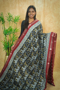 ASM1534 Black and Deep Maroon kalamkari cotton saree with peacock and floral prints.