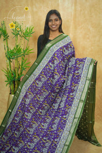 ASM1535 Royal Purple and Deep Olive Green kalamkari cotton saree with peacock and floral prints.