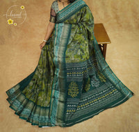ASM1732 Moss Green Viscose saree features a subtle floral-shadow print with zari border.