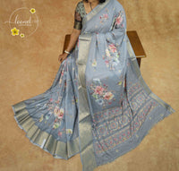 AVD4432 Steel Grey Moss Satin saree features digital floral prints with zari border.