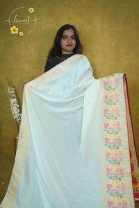 AVD6432 Off-White Pasmina silk saree with solid plain body Meenakari-style pattern.
