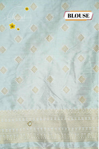 AVD6432 Off-White Pasmina silk saree with solid plain body Meenakari-style pattern.