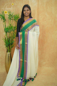 AWB7220 Off-White mul cotton saree features a plain body Tri-color border.