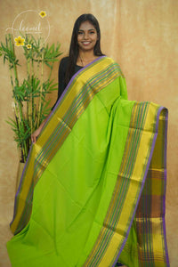 AWB7230 Parrot Green mul cotton saree features a plain body with lavender and golden zari striped border.