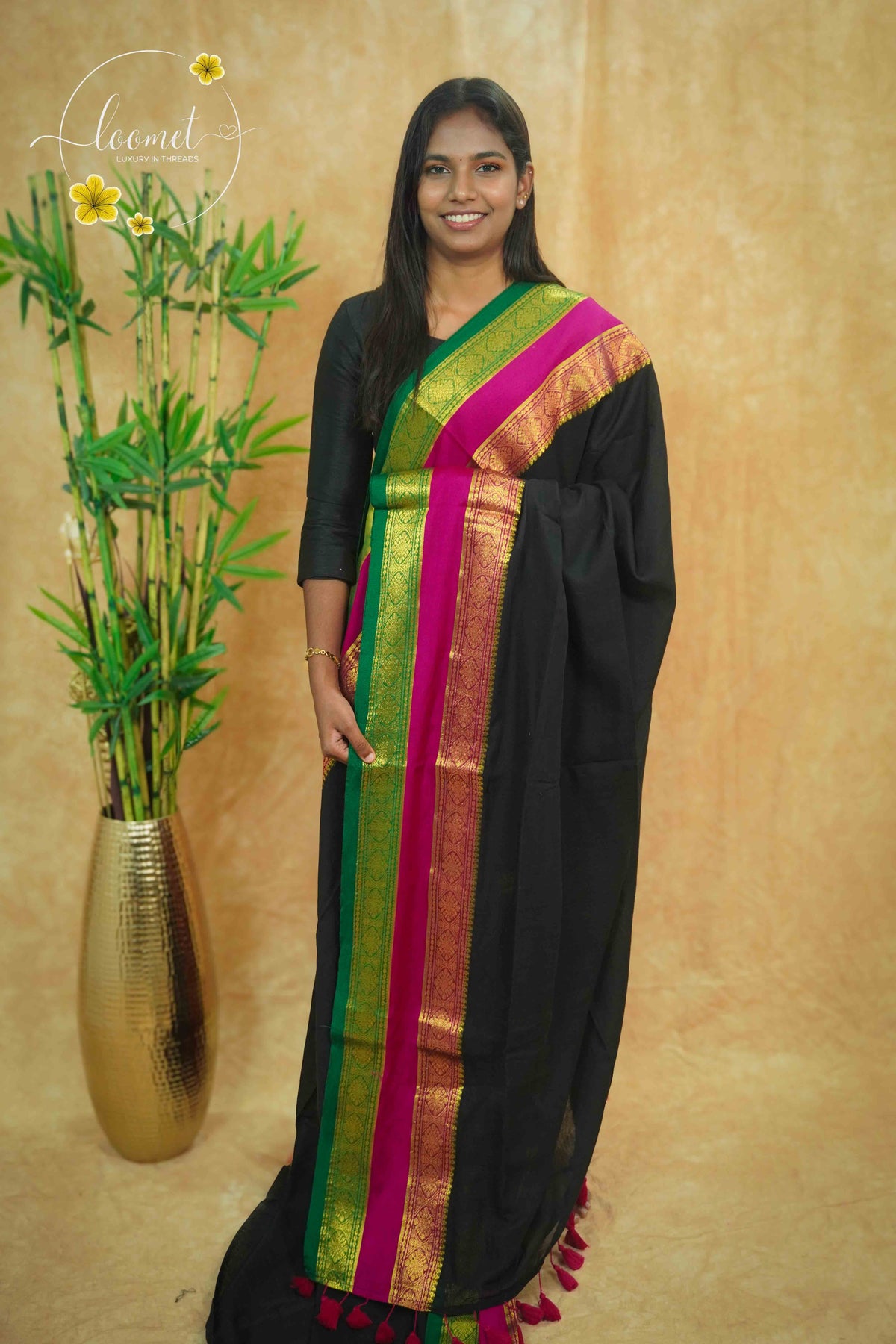 AWB7270 Black mul cotton saree features a plain body with Tri-colour border.